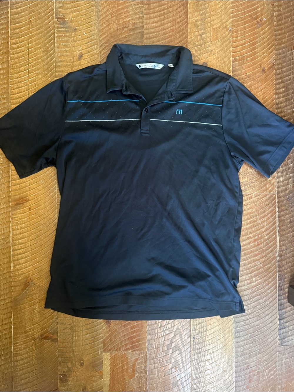 Travis Mathew Black Polo with Teal Accent